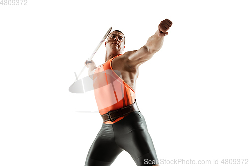 Image of Male athlete practicing in throwing javelin isolated on white studio background