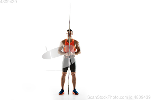 Image of Male athlete practicing in throwing javelin isolated on white studio background