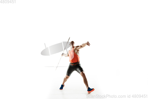 Image of Male athlete practicing in throwing javelin isolated on white studio background