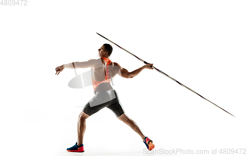 Image of Male athlete practicing in throwing javelin isolated on white studio background