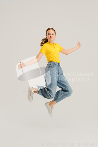 Image of Caucasian girl isolated on white studio background. Copyspace. Childhood, education, emotions concept