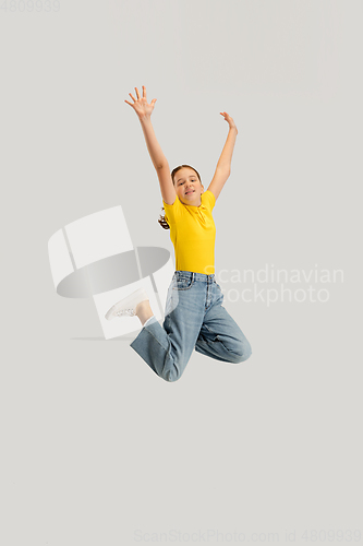 Image of Caucasian girl isolated on white studio background. Copyspace. Childhood, education, emotions concept