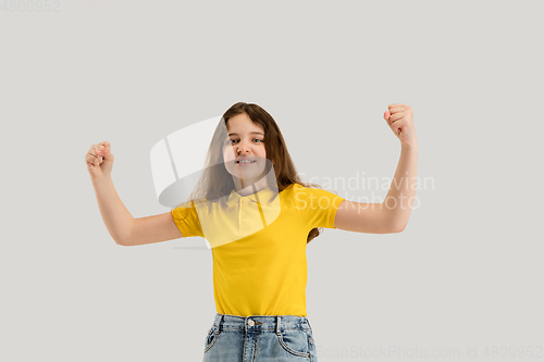 Image of Caucasian girl isolated on white studio background. Copyspace. Childhood, education, emotions concept