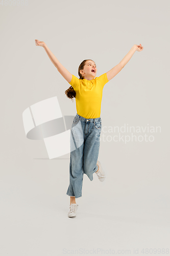 Image of Caucasian girl isolated on white studio background. Copyspace. Childhood, education, emotions concept