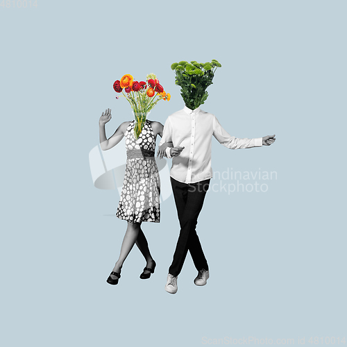 Image of Contemporary art collage, modern design. Retro style. Couple of dancers headed with flowers and plants on blue pastel background.