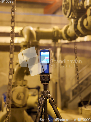 Image of lidar laser scanning device at job site creating point cloud