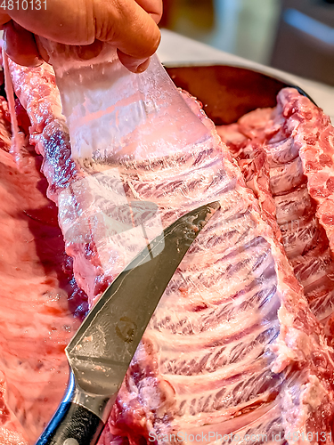 Image of raw seasoned bbq ribs ready for cooking