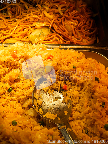 Image of trays of seafood and bbq at a restaurant