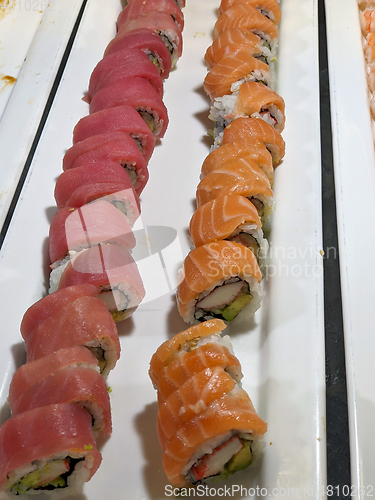 Image of trays of seafood and bbq at a restaurant