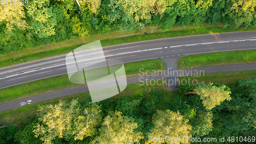 Image of Top view of a gentle curve of the asphalt road