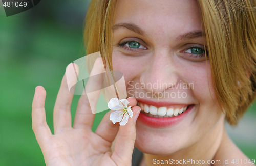 Image of Woman with flower