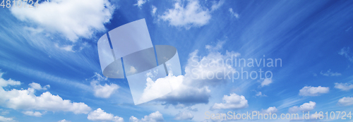 Image of Fluffy Clouds in Sunny Day