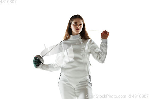 Image of Teen girl in fencing costume with sword in hand isolated on white background