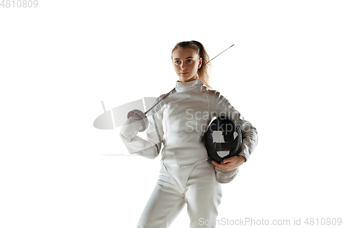 Image of Teen girl in fencing costume with sword in hand isolated on white background