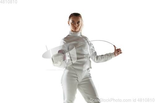 Image of Teen girl in fencing costume with sword in hand isolated on white background