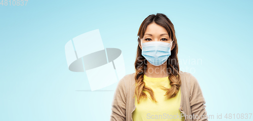 Image of asian young woman in protective medical mask