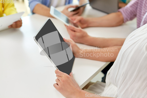 Image of group of high school students with tablet pc