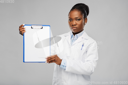 Image of african american female doctor with clipboard