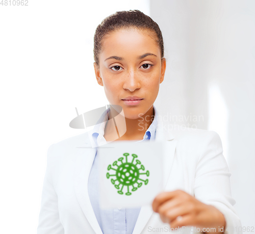 Image of african american doctor with coronavirus sign