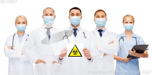 Image of doctors in medical masks with biohazard sign