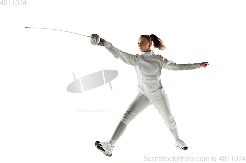 Image of Teen girl in fencing costume with sword in hand isolated on white background