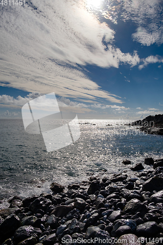 Image of beautiful wild beach with black sand