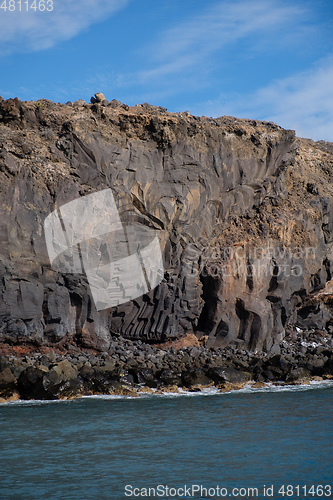 Image of beautiful wild beach with black sand