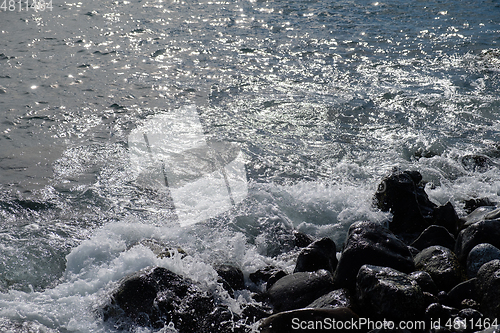 Image of beautiful wild beach with black sand