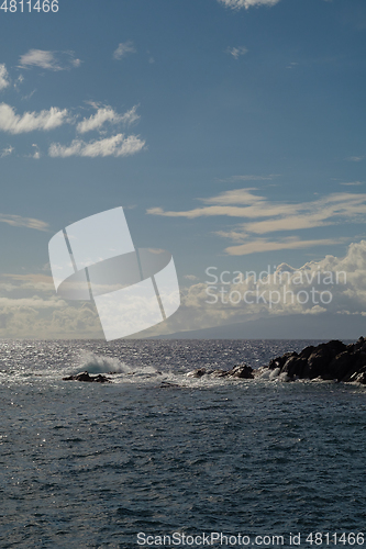 Image of beautiful wild beach with black sand