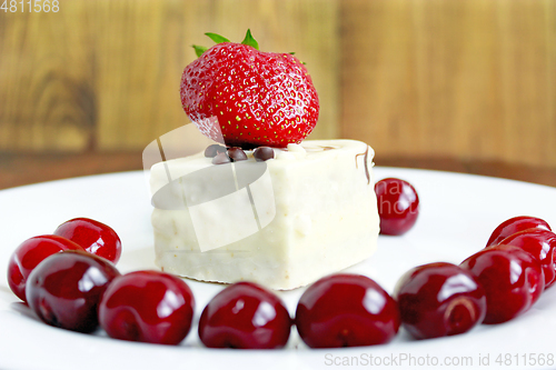 Image of ripe red berries of strawberry cherry and cake on the plate