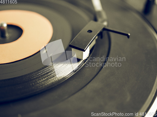 Image of Vintage looking Vinyl record on turntable