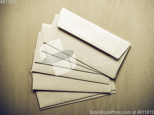 Image of Vintage looking Letter envelope on wood table