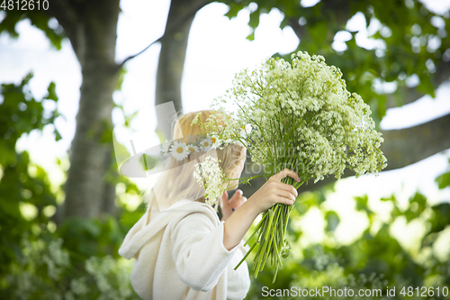 Image of Girl Wearing a Flower Wreath