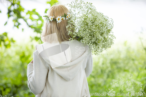 Image of Girl Wearing a Flower Wreath