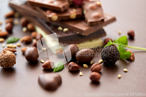 Image of close up of different chocolates, candies and nuts