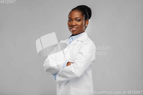 Image of happy african american female doctor or scientist