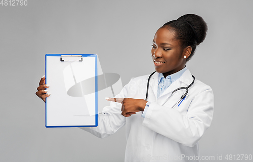 Image of african american female doctor with clipboard