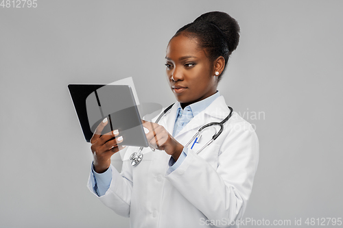 Image of african american female doctor with tablet pc
