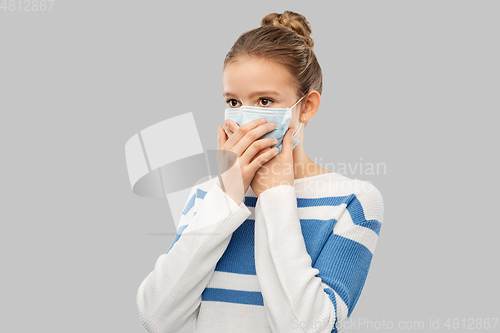 Image of teenage girl in protective medical mask