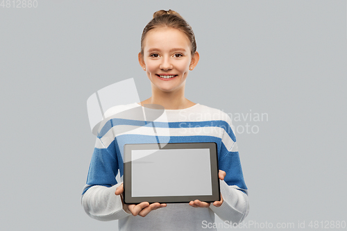 Image of happy smiling teenage girl with tablet computer