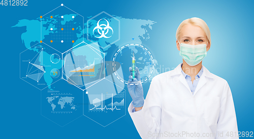 Image of doctor in medical mask over world pandemia map