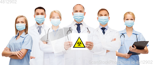 Image of doctors in medical masks with biohazard sign