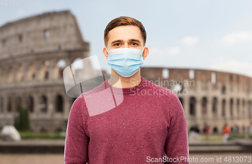 Image of man wearing protective medical mask in italy