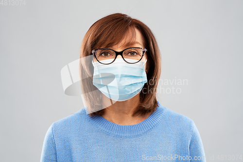 Image of senior woman in protective medical mask
