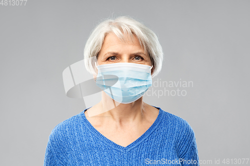 Image of senior woman in protective medical mask