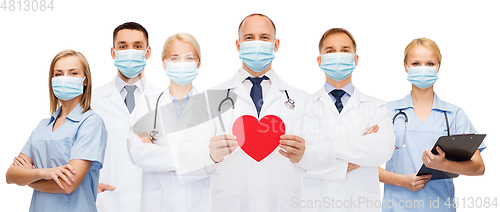 Image of doctors in protective medical masks with red heart