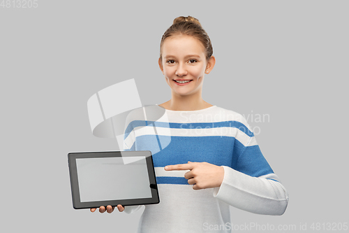 Image of happy smiling teenage girl with tablet computer
