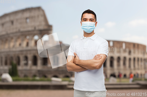 Image of man wearing protective medical mask in italy