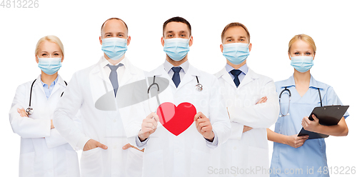 Image of doctors in protective medical masks with red heart