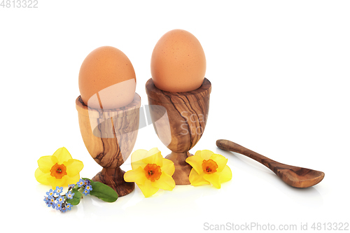Image of Healthy Fresh Eggs for Breakfast with Spring Flowers